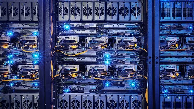 IT monitoring screens displaying system performance metrics